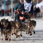 Mushers begin rugged Iditarod race after lack of snow forces major changes to iconic Alaska event