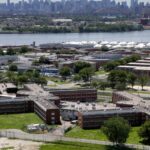 NYC lets immigration officials open an office at Rikers jail, a priority for Trump