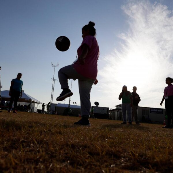 Suit challenges new rules on children in federal…