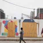 A mural honoring Jackie Robinson and Minnie Miñoso is defaced with racist graffiti in Miami