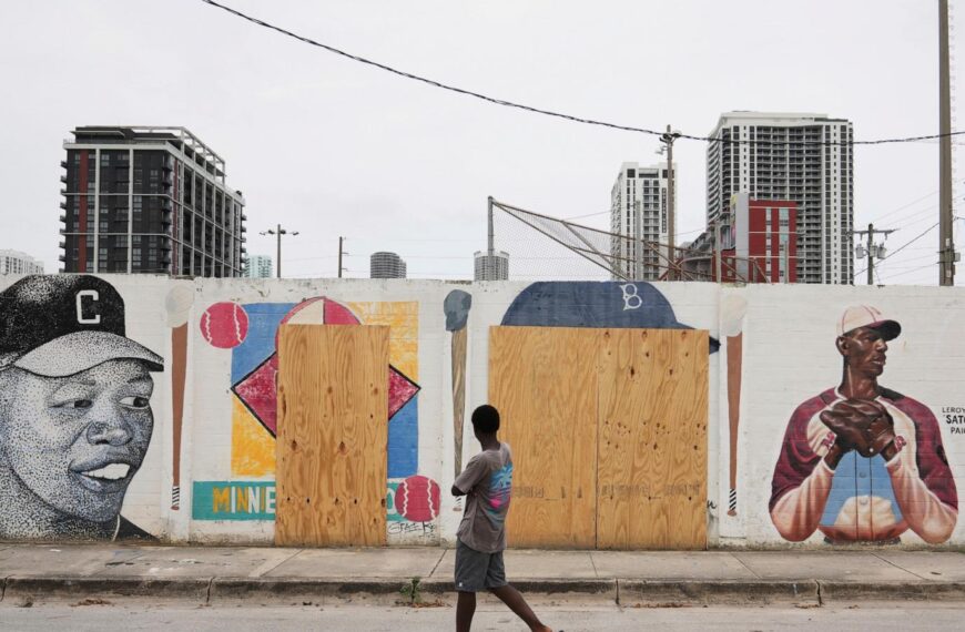 A mural honoring Jackie Robinson and Minnie Miñoso is defaced with racist graffiti in Miami