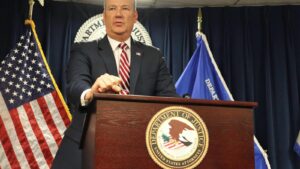 ICE chief defends agents’ use of masks, decries…