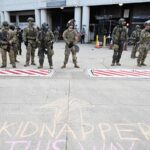 Photos of Marines in combat gear in Los Angeles as protests against immigration raids continue