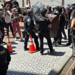 Protests over immigration raids pop up across the US with more planned