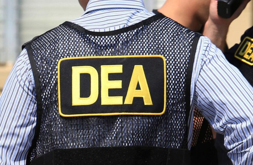 DEA informant charged in alleged scheme to extort…