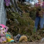 Searchers in helicopters and on horseback scour Texas flood debris for the missing