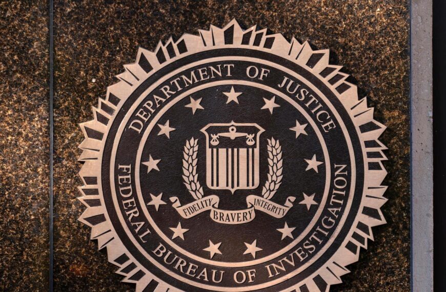 Senior FBI official who resisted Trump administration demands has been pushed out, AP sources say