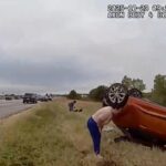 Baby pulled from overturned vehicle in dramatic rescue