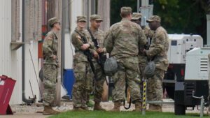 National Guard troops are outside Chicago and could…