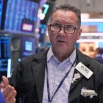 World shares are mixed in holiday-thinned trading with Wall Street closed for Thanksgiving