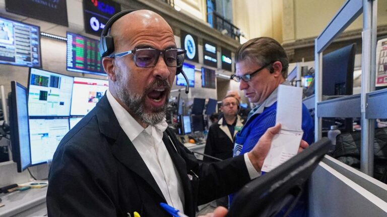 US futures slip and Asian stocks are mixed, while oil prices surge more than $1 a barrel