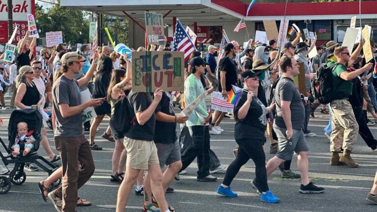 Safety volunteer charged in the fatal shooting of a Utah 'No Kings' protester