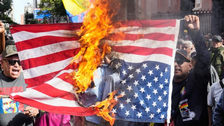 Maduro arrives in US after stunning capture in operation that Trump says will let US 'run' Venezuela