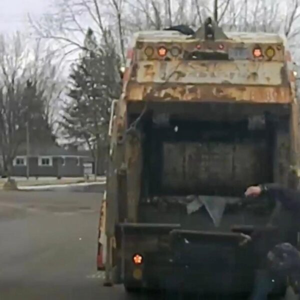 Ohio sanitation worker surprised to find police suspect…