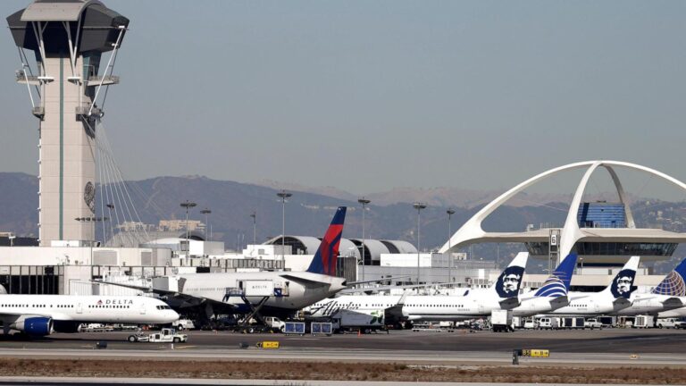 United flight returns to LA airport for an evacuation after a reported fire