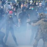 Portland residents near ICE building win court order limiting agents’ tear gas use