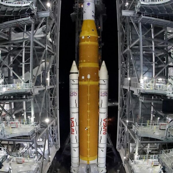 NASA hauls repaired moon rocket from hangar back…