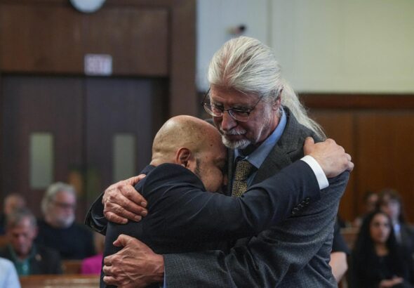 Judge tosses murder conviction for man who served 25 years