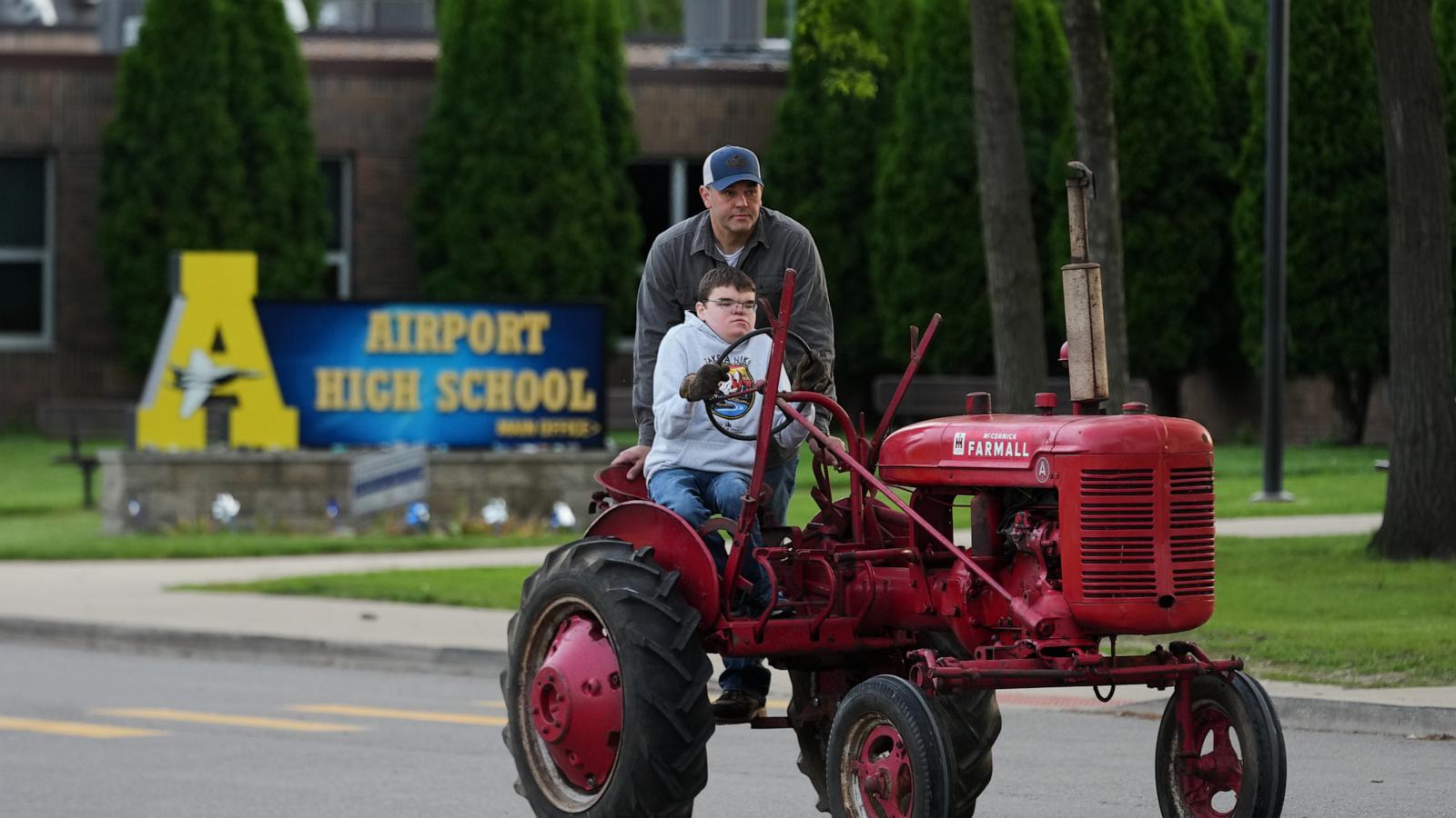 Michigan seniors arrive at school in style on Tractor Day