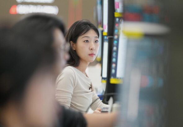 Asian markets are mixed and oil is steady after Wall Street hits records