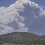 Dangerous weather hampers firefighters and leads to fireworks bans in western US