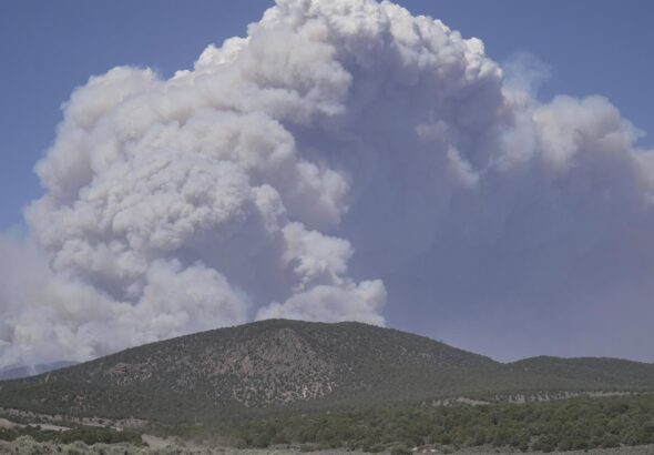 Dangerous weather hampers firefighters and leads to fireworks bans in western US