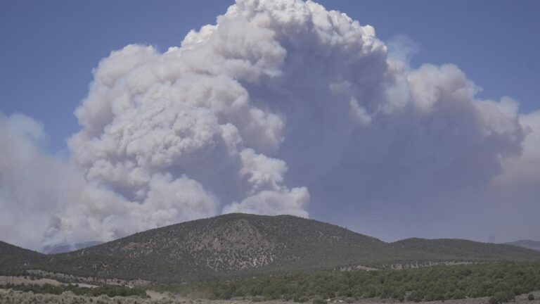 Dangerous weather hampers firefighters and leads to fireworks bans in western US