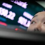 Asian stocks mostly decline on a sell-off of chip shares, with Kospi down nearly 8%