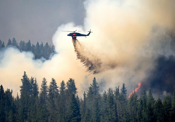 Oregon firefighters brace for windy and hot weather as they battle dozens of blazes