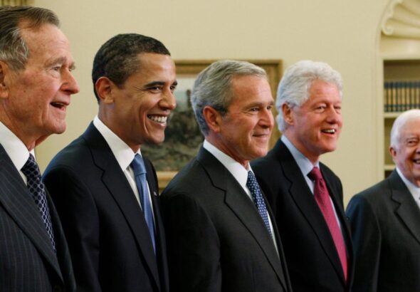 Trump goes unmentioned but not ignored as Clinton, Bush and Obama step up as essayists on presidents