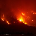 Wildfires burn across western US and Canada as residents are evacuated