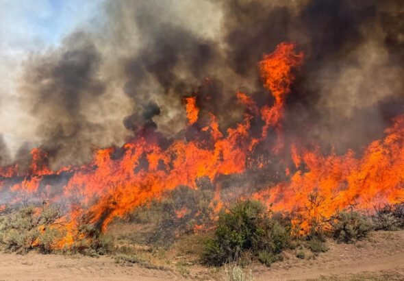 Dangerous wildfire keeps crews from reaching helicopter crash in Utah