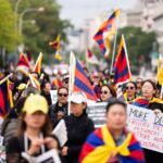 Protesters of Xi's policies push for change in earshot of White House visit with Trump