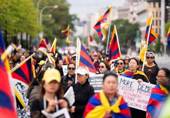 Protesters of Xi's policies push for change in earshot of White House visit with Trump