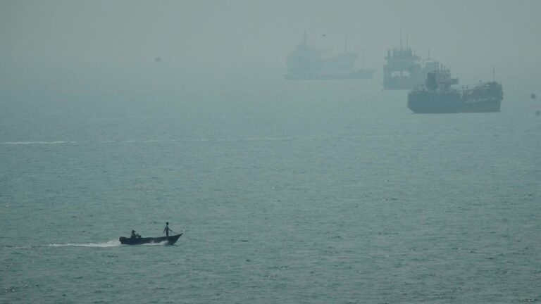 An Iranian commercial ship is struck near Strait of Hormuz with 1 dead, Iranian media say