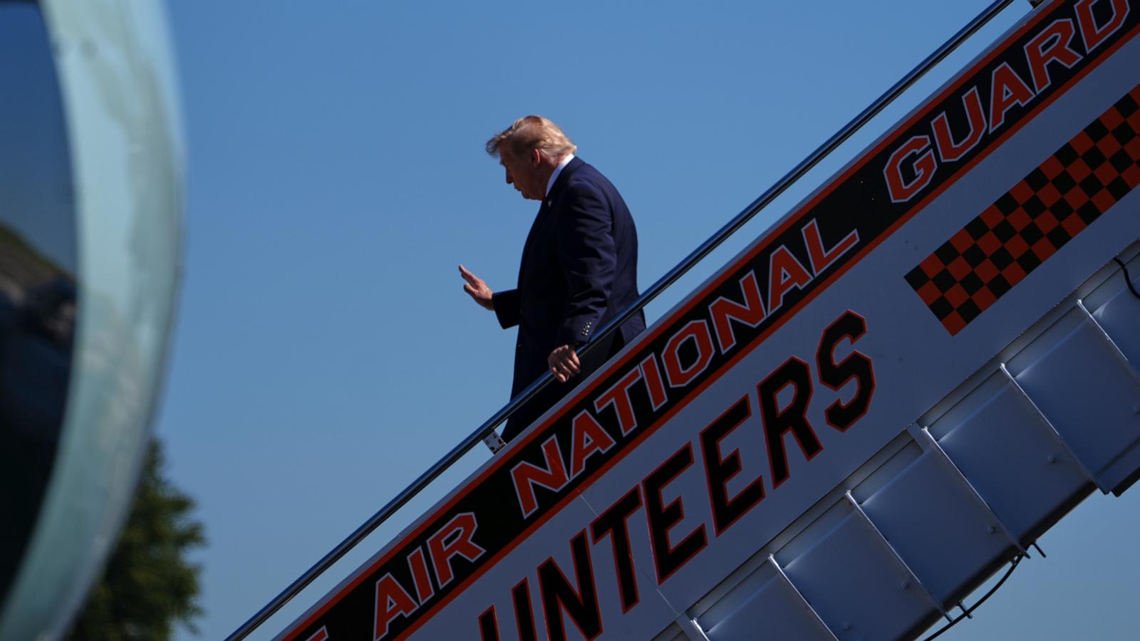 CNN says it was left off Air Force One for Trump's Saturday trip to a college football game