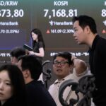 Global benchmarks mostly rise after Wall Street's rally
