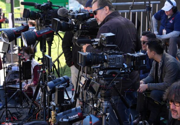 DOJ says it's investigating whether White House TV pool's coverage halt violated antitrust law