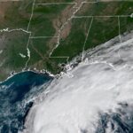 El Niño's storm-killer winds and climate's warming waters in fight over future of Hurricane Isaias