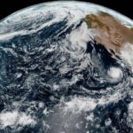 Nolo changes from a hurricane to a typhoon after crossing the international date line