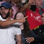 Trump interrupted by protesters as he fights to rally Texas voters behind Paxton in US Senate race