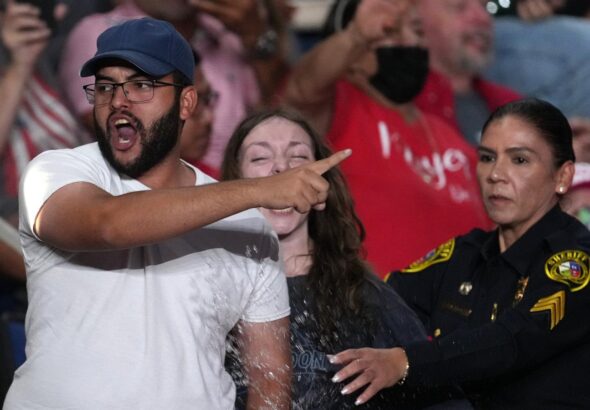 Trump interrupted by protesters as he fights to rally Texas voters behind Paxton in US Senate race