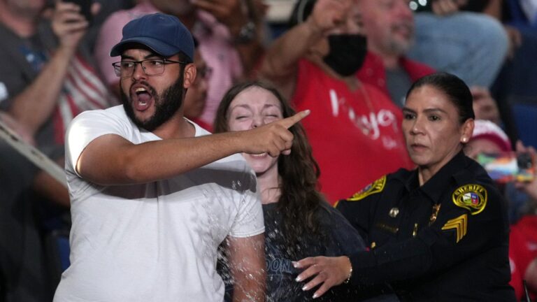 Trump interrupted by protesters as he fights to rally Texas voters behind Paxton in US Senate race